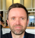 Headshot of man with beard