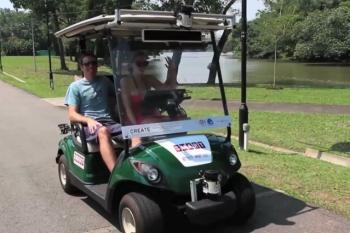 Photo of autonomous golf cart.